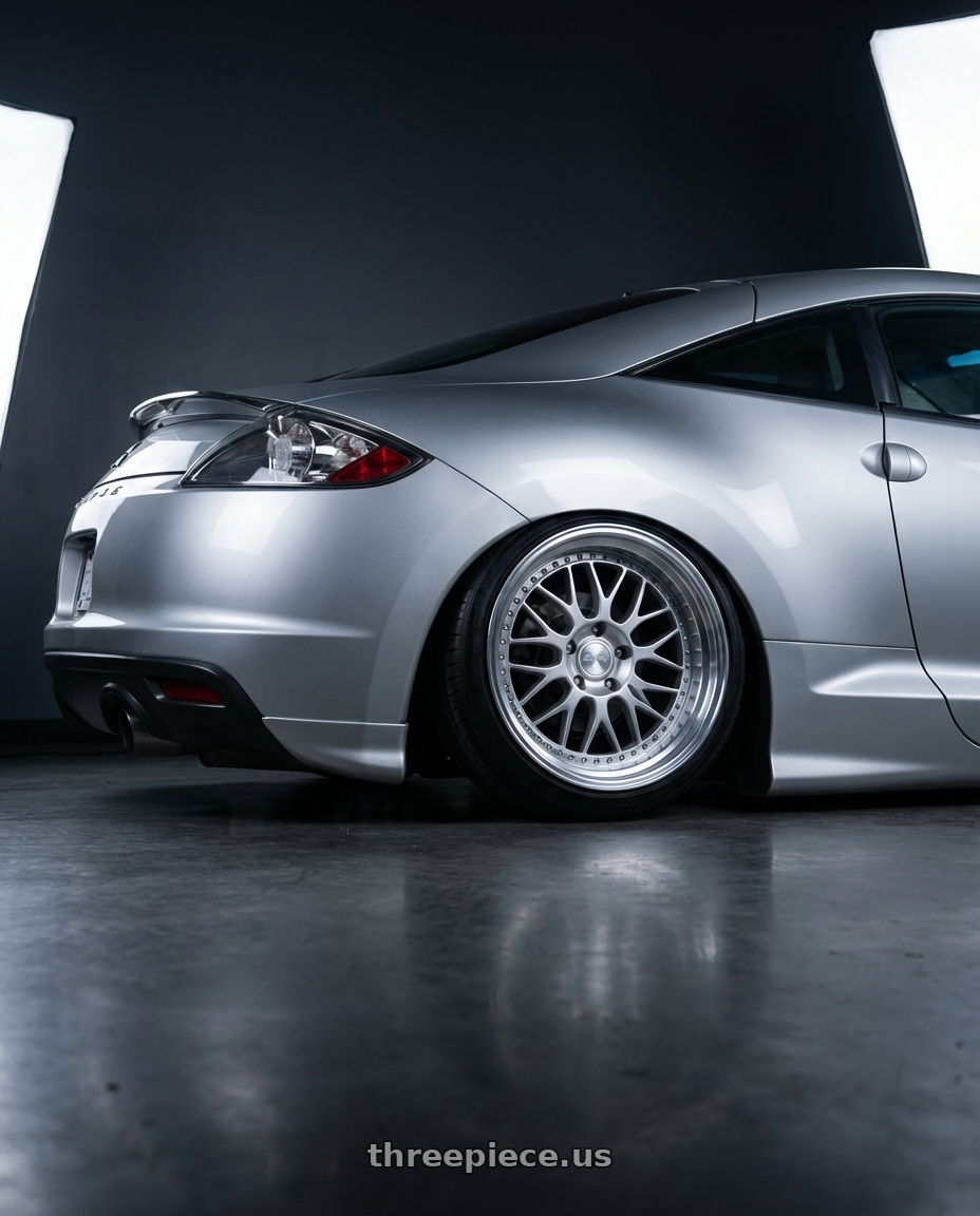 2010 Mitsubishi Eclipse with ESR Wheels SR SERIES SR01 5x114.3 19x9.5 +15 Hyper Silver wheels rear three quarter view slight stretch tires