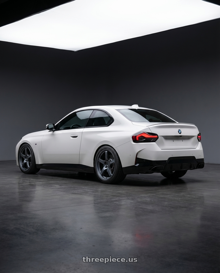 2024 BMW 2 Series G42 with Gram Lights 57CR 5x112 19x10.5+35 Gunblue II wheels rear three quarter view square tires