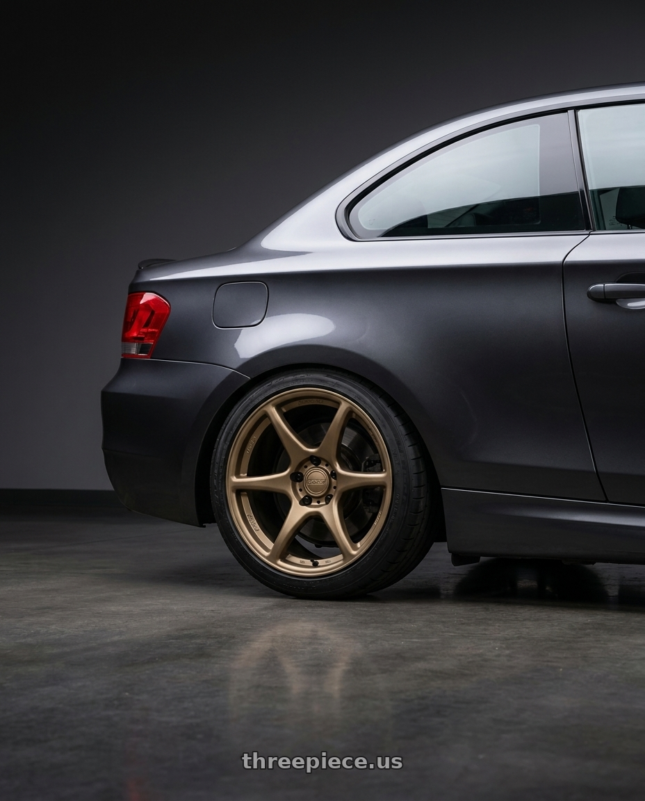2012 BMW 1 Series E82 with Kansei K11B Tandem 5X120 18x8.5 35 Bronze wheels rear three quarter view square tires