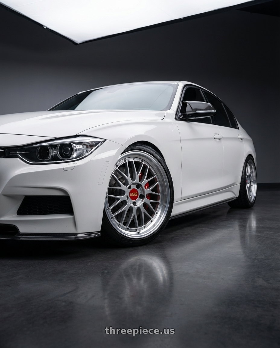 White 2014 BMW 335i with BBS LM 5x120 19x9.5+22 Diamond Silver wheels front three quarter view lowered stance