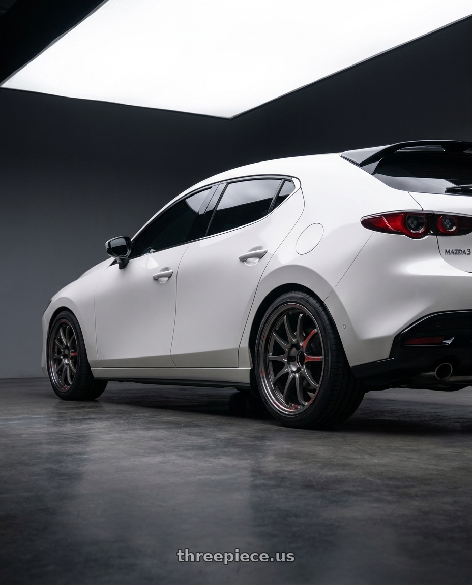 2024 Mazda3 Fastback  with Volk Racing CE28SL 5x114.3 18x8.5+45 wheels rear three quarter view square tires