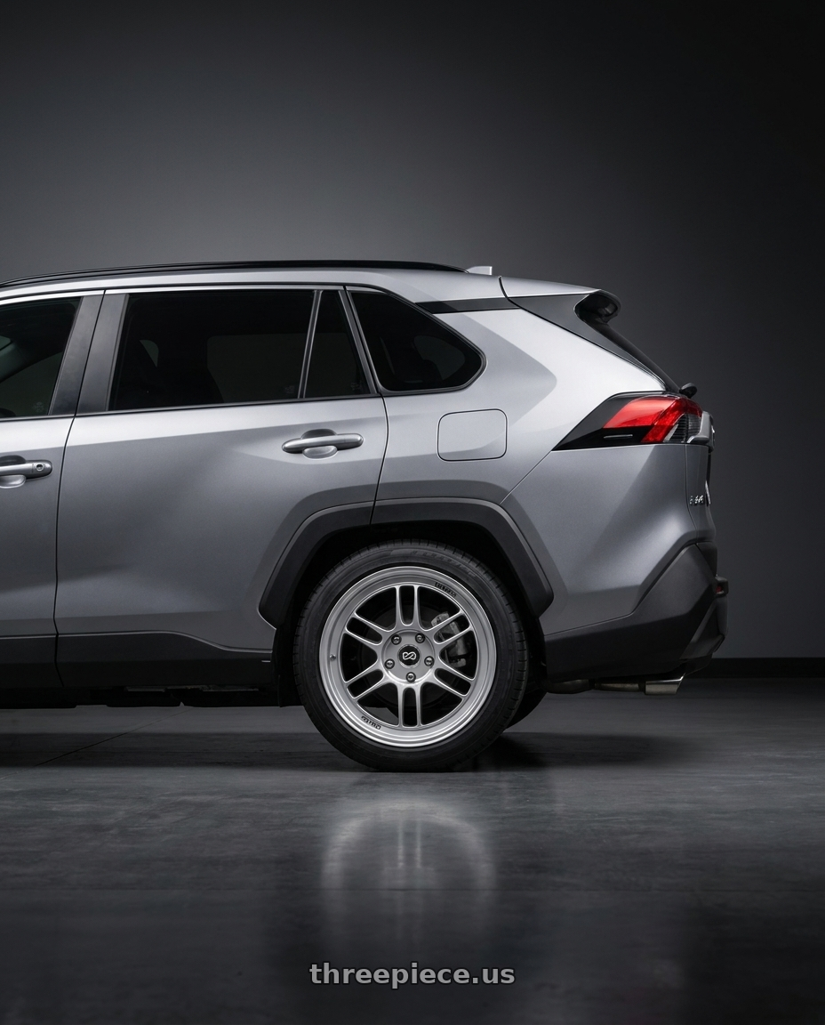 2019 Toyota RAV4  with Enkei RPF1 5x114.3 18x8+35 Silver wheels rear three quarter view square tires