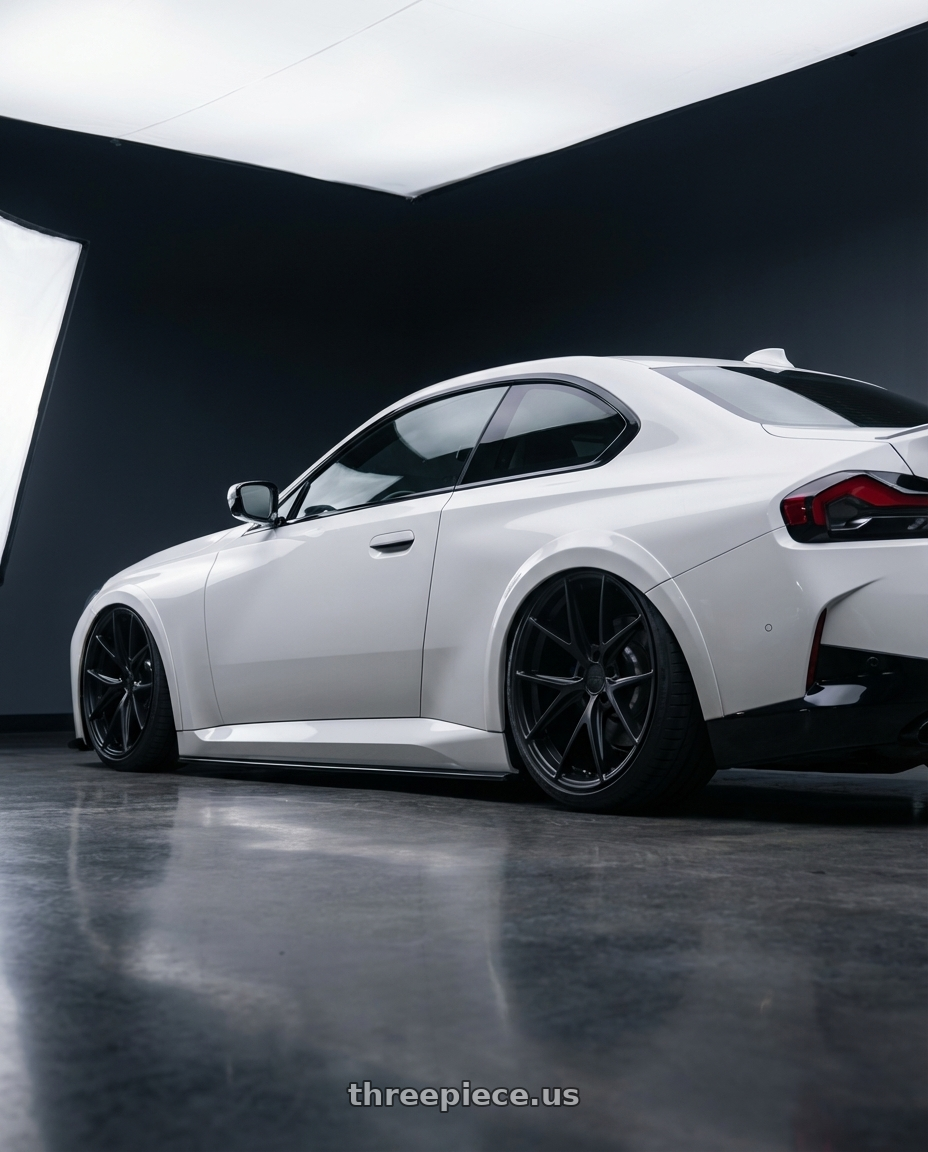 2024 BMW 2 Series G42 with Niche 1PC M117 MISANO 5X112 19X8.5 +34 MATTE BLACK wheels rear three quarter view slight stretch tires