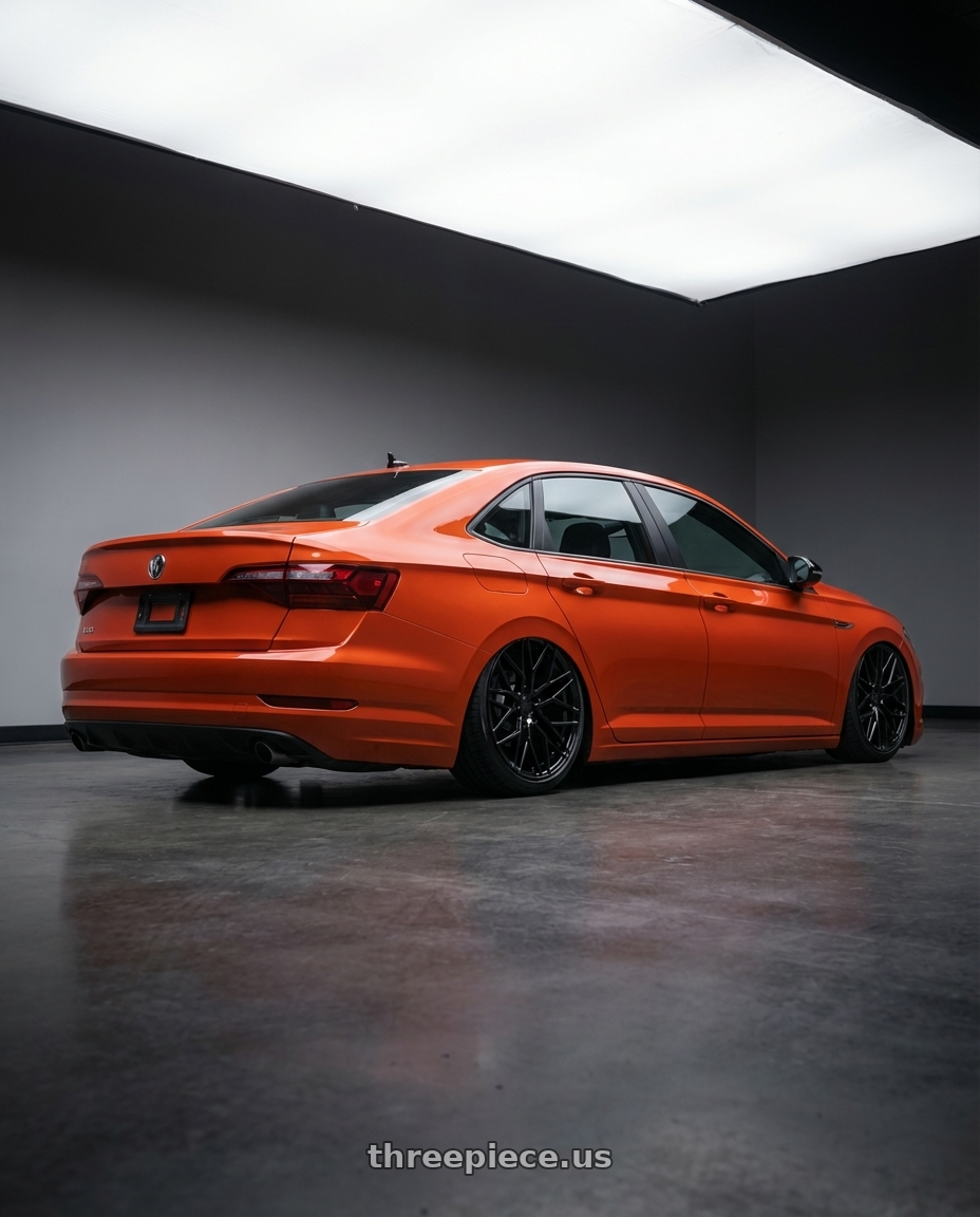 2023 Volkswagen Jetta GLI MK7 with Avant Garde Wheels M520R 5X112 19x8.5 +35 Gloss Black wheels rear three quarter view slight stretch tires