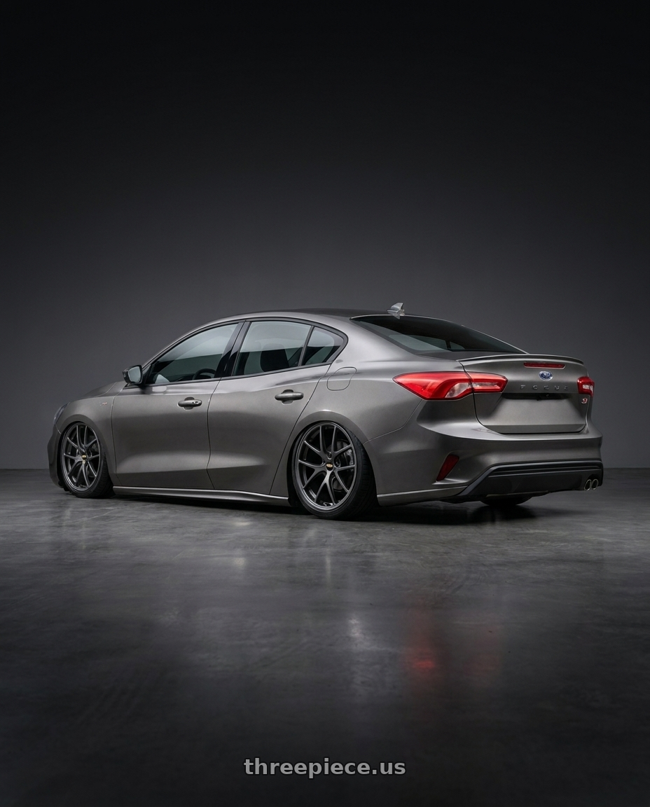 2022 Ford focus st line sedan with BBS RI-A 5x120 18x9.5+23 Matte Gray wheels rear three quarter view slight stretch tires