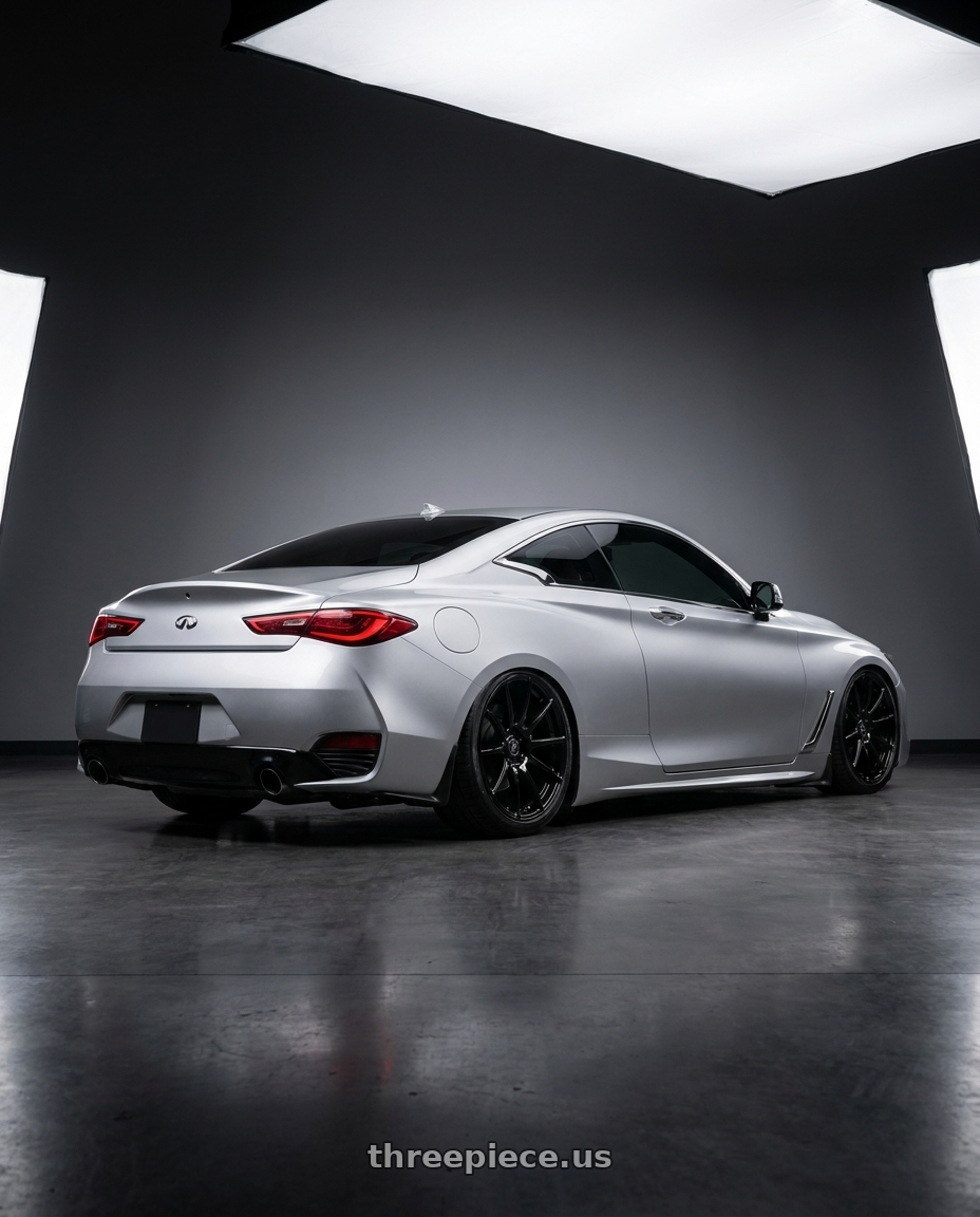2020 Infiniti Q60 with Forgestar CF10 5x114.3 20x9.5 +29 Gloss Black wheels rear three quarter view slight stretch tires