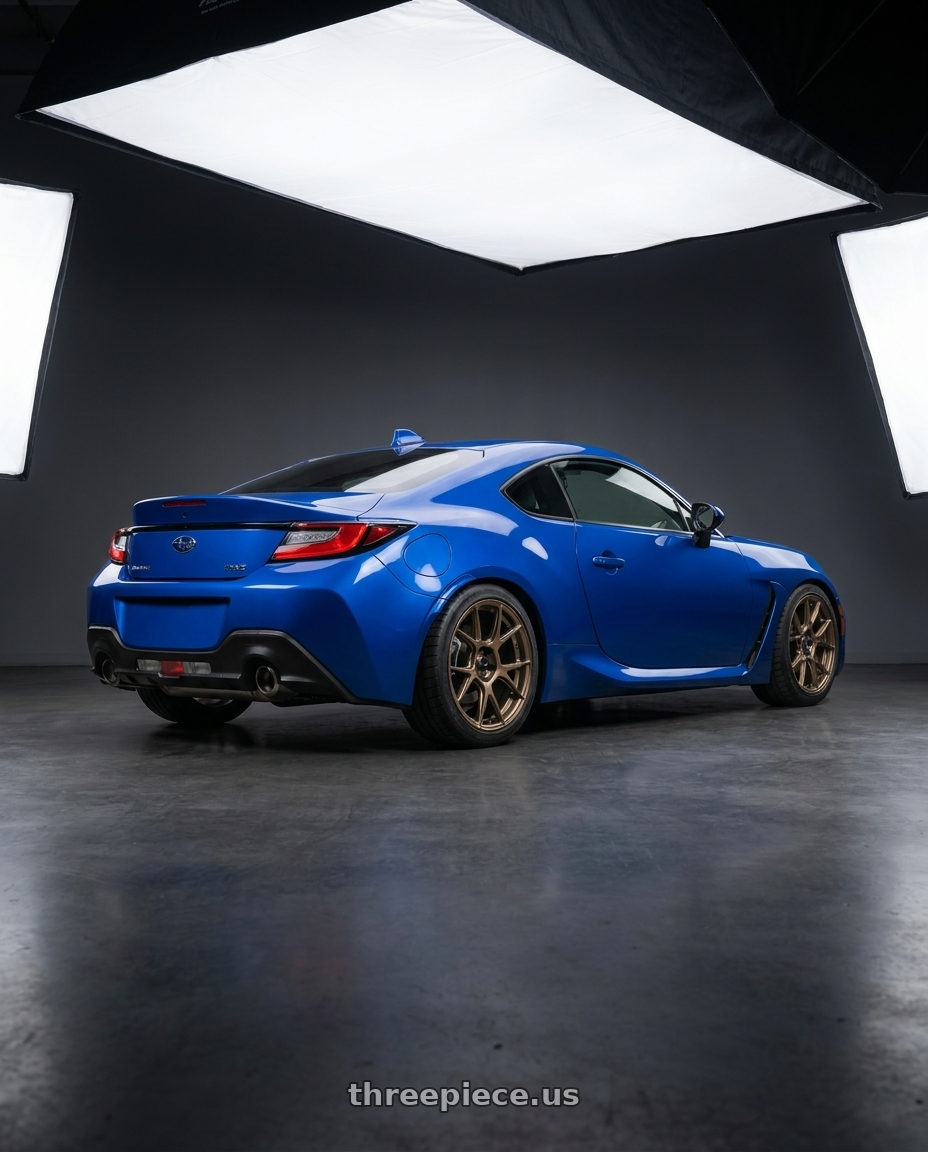 2024 Subaru BRZ with Konig Ampliform 5x114.3 18x9.5+25 Gloss Bronze wheels rear three quarter view square tires
