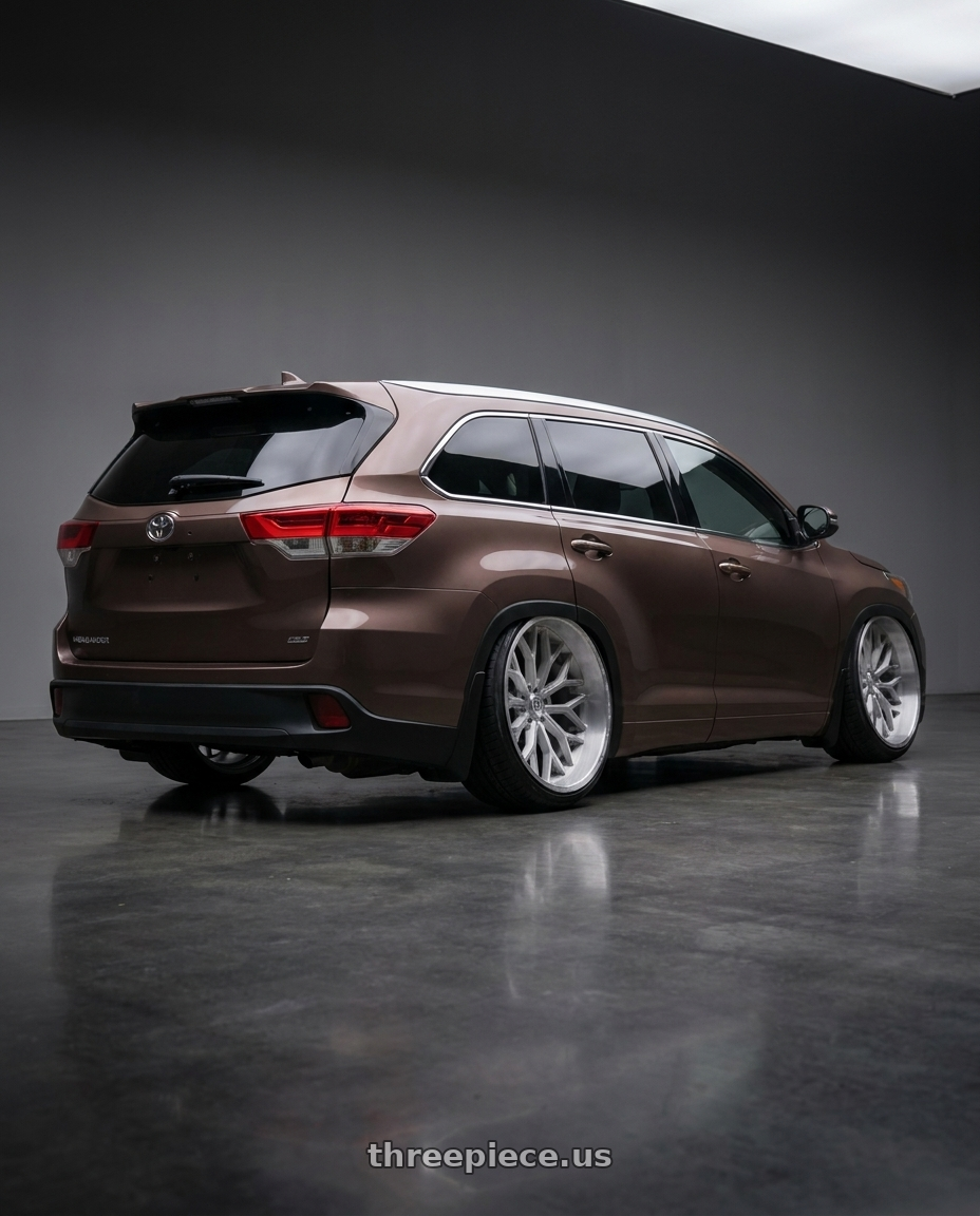 2018 toyota highlander with TIS 565BSM 6x139.7 22x12 -44 Brushed Silver & Milled wheels rear three quarter view extreme stretch tires