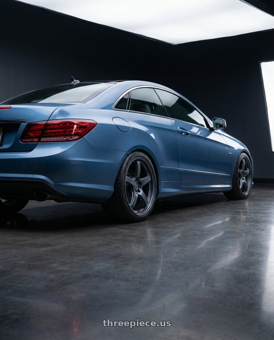 2014 Mercedes-Benz E-Class Coupe C207 with Gram Lights 57CR 5x112 19x10.5+22 Gunblue II wheels rear three quarter view square tires