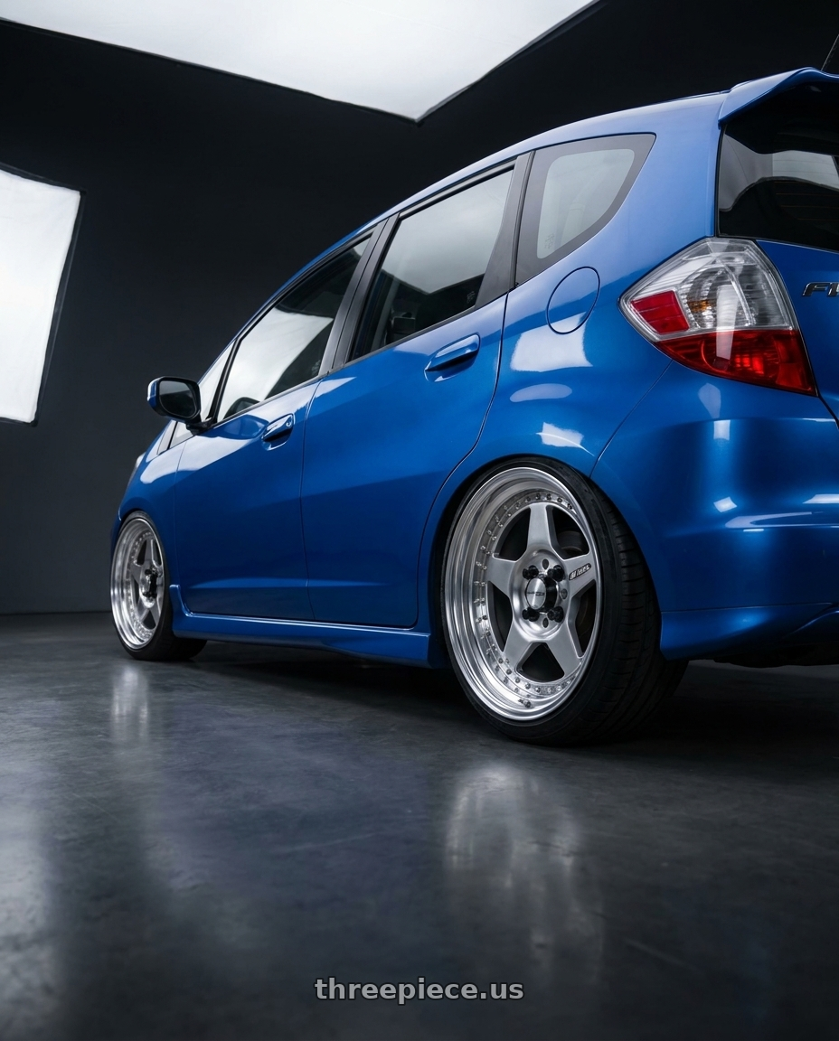 2012 Honda Fit with Work Meister Cr01 4x100 16x7+35 A Disk Bright Buff Finish wheels rear three quarter view square tires
