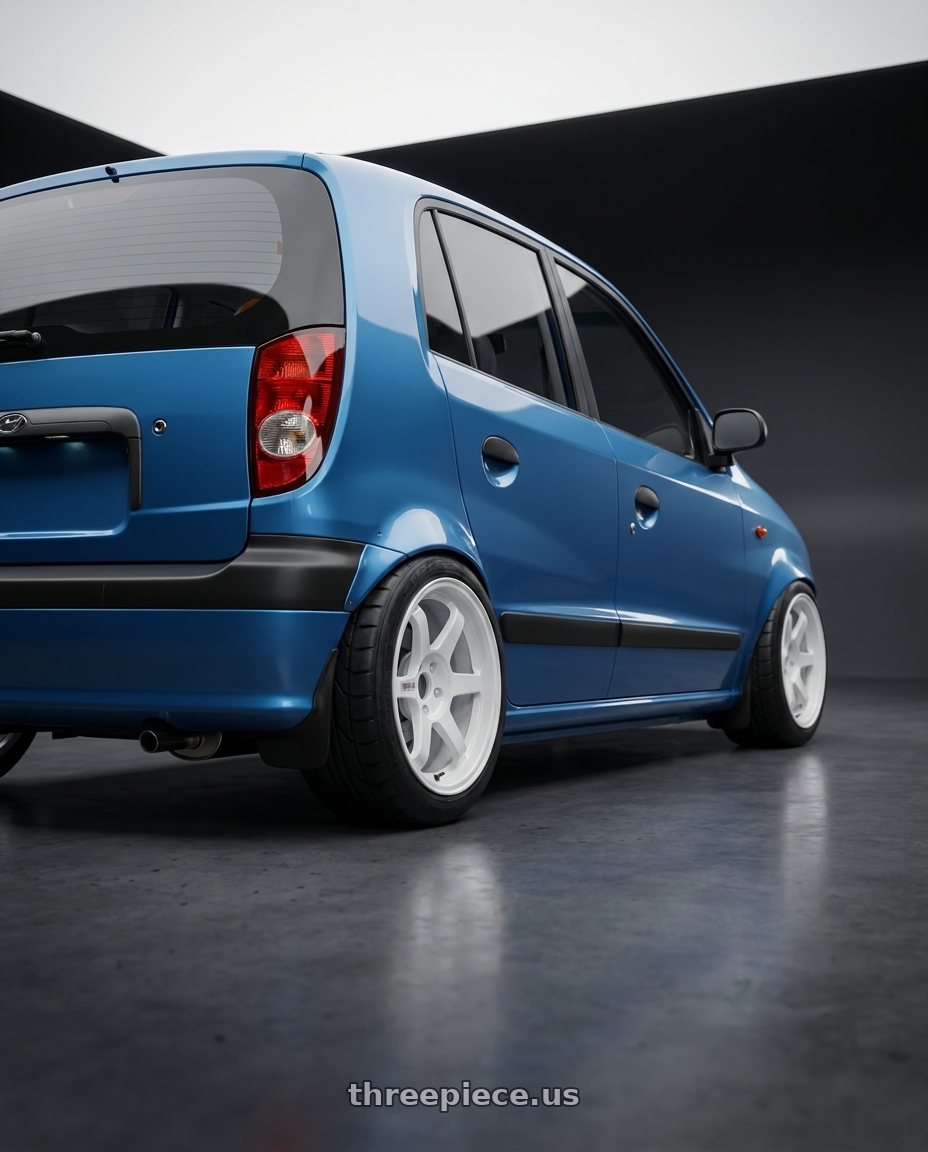 2000 hyundai atos with Volk Racing TE37SL 4x100 15x8 +25 DASH WHITE wheels rear three quarter view meaty tires