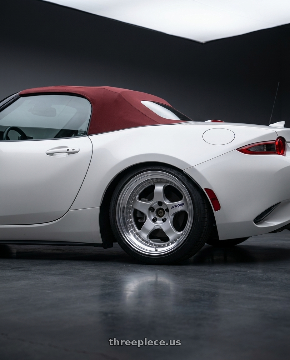 2020 Mazda MX-5 Miata GT with Work Meister S1 3P 4x100 17x8+3 A Disk Silver wheels rear three quarter view square tires