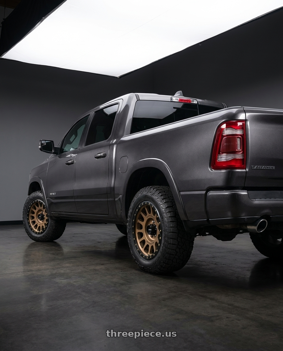 2021 Ram 1500 Laramie with Method Race Wheels 305BZ NV 6x139.7 18x9 -12 METHOD BRONZE wheels rear three quarter view square tires