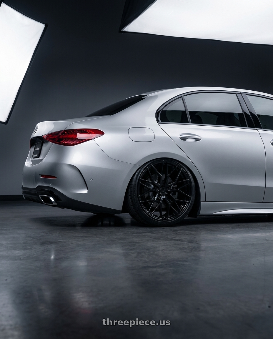 2022 Mercedes-Benz C-Class W206 with Avant Garde Wheels M520R 5X112 19x9.5 +40 Gloss Black wheels rear three quarter view slight stretch tires