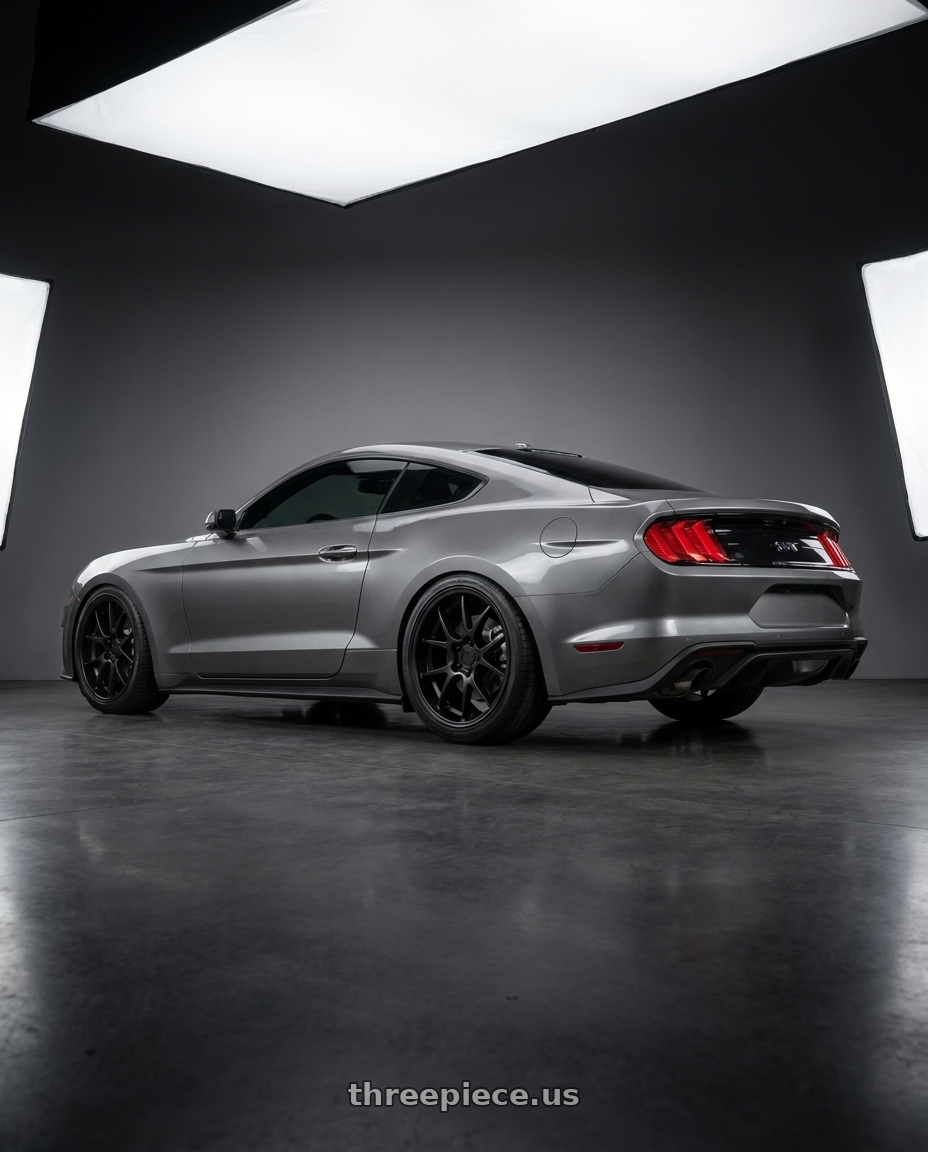 2021 Ford Mustang GT with Rotiform 207 5x114.3 19x9.5 +38 MATTE BLACK wheels rear three quarter view square tires