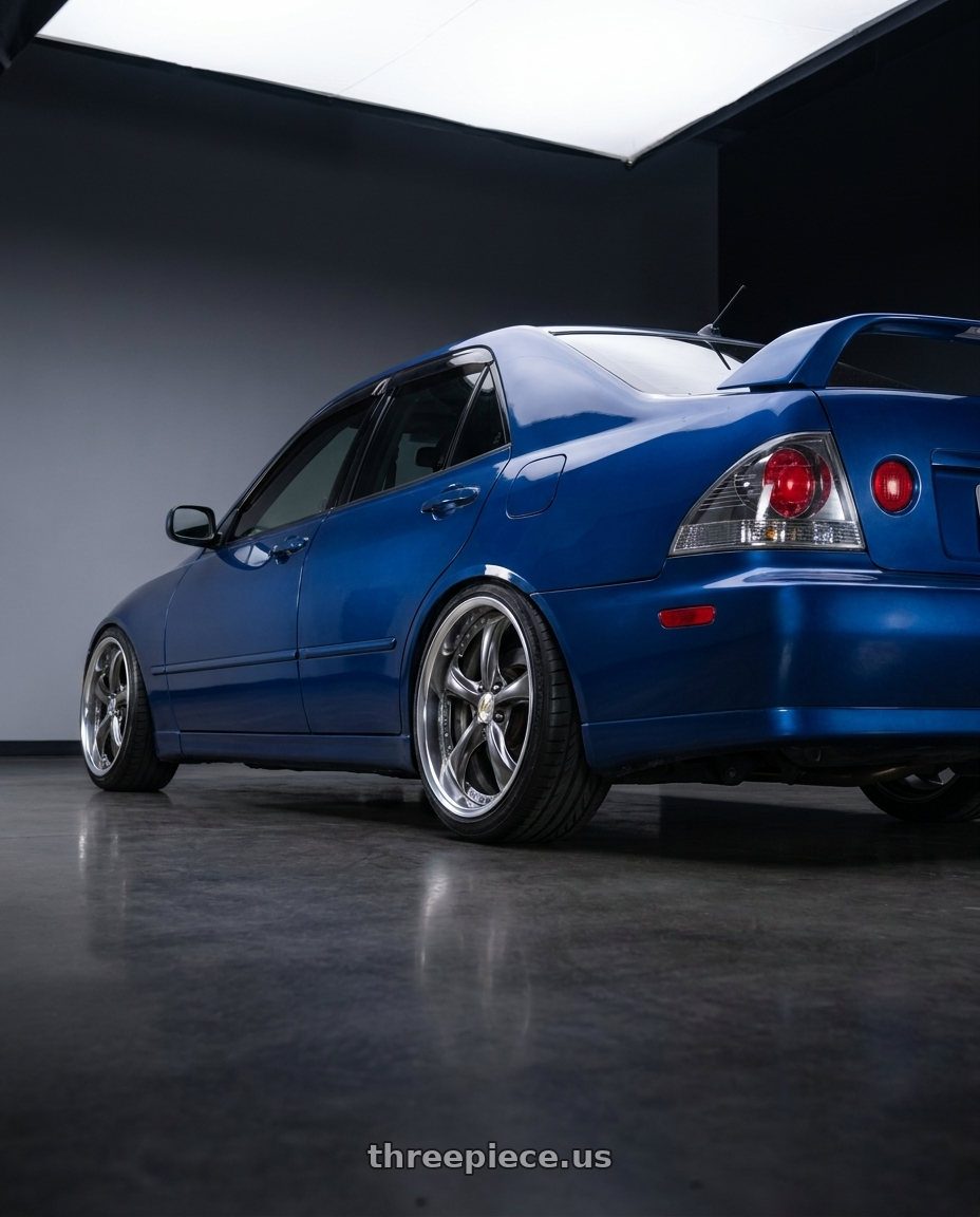 2002 Lexus is300 blue with Work Wheels VS-KF 5x114.3 18x9+40 Brilliant Silver Black A Disk FULL REVERSE wheels rear three quarter view slight stretch tires