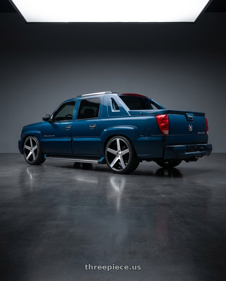2005 Cadillac Escalade with Status EMPIRE 6X135 26X10 +30 GLOSS BLACK W/ MACHINED FACE wheels rear three quarter view extreme stretch tires