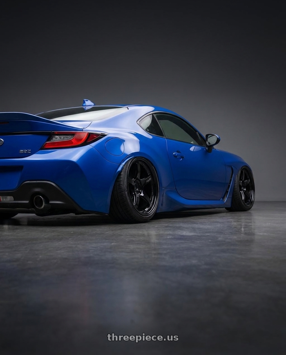 2024 Subaru BRZ with Gram Lights 57CR 5x114.3 18x8.5+50 Glossy Black wheels rear three quarter view slight stretch tires