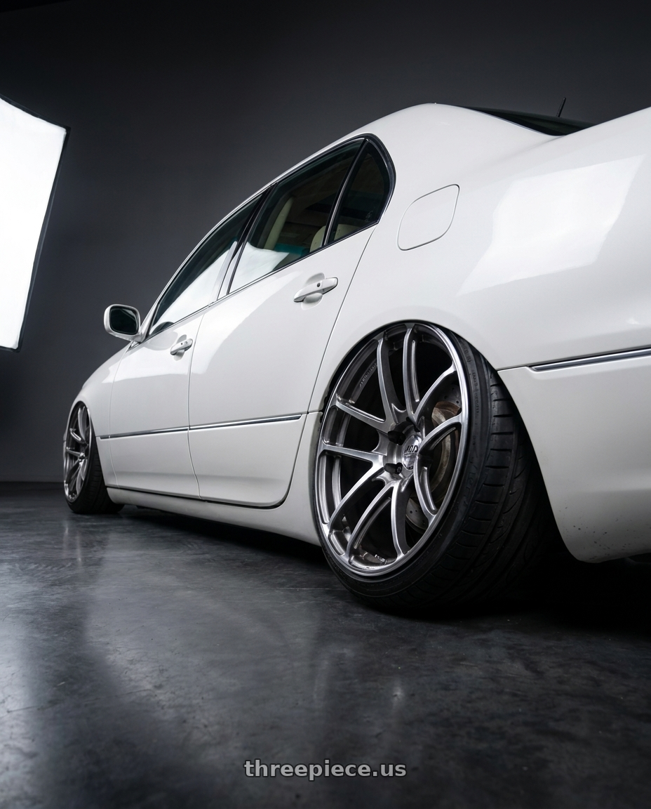 2004 lexus ls430 with Advan Racing MODEL F50 5x114.3 20x11.0 +40 PLATINUM RED COMBI wheels rear three quarter view extreme stretch tires