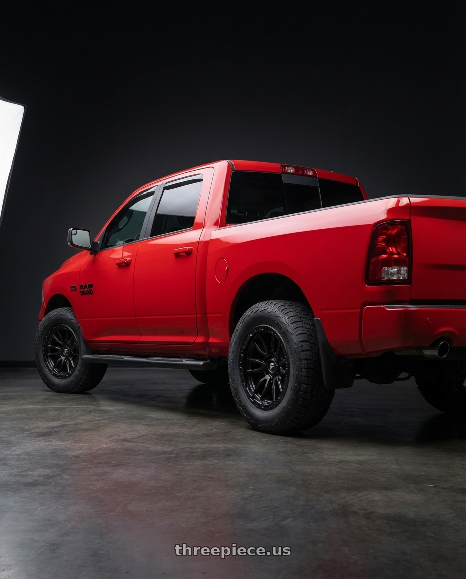 2016 Dodge Ram 1500  with Fuel 1PC D679 REBEL 5X127 20X10 -18 MATTE BLACK wheels rear three quarter view meaty tires