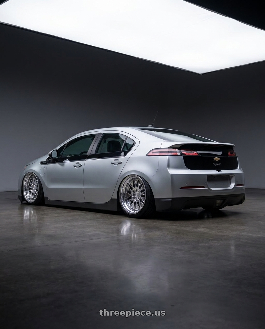 2010 Chevrolet Volt with Heritage Wheel BELFORT wheels rear three quarter view slight stretch tires
