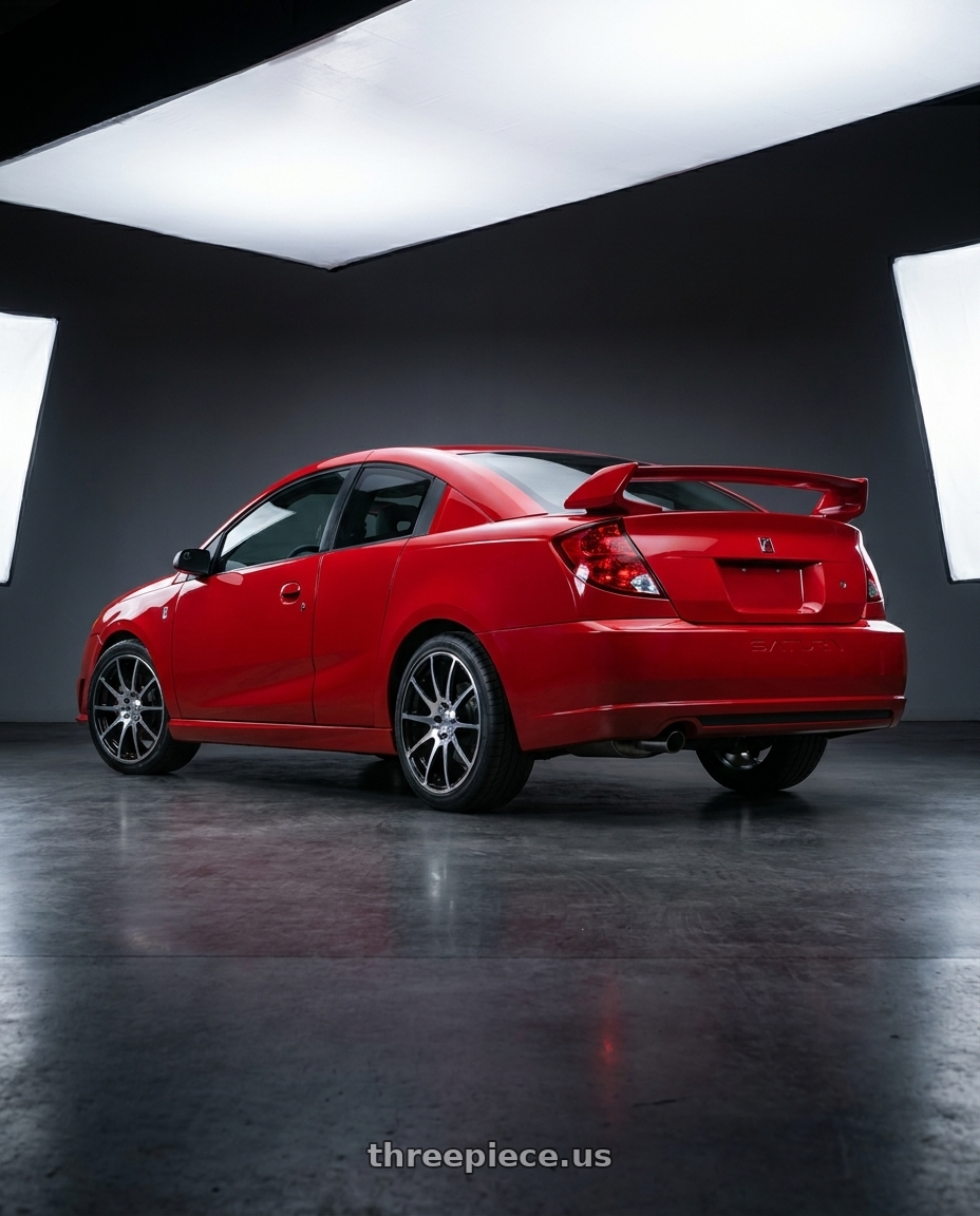 2005 Saturn Ion Redline Chili Pepper Red with Maxxim 44B Champ 5X110/5X115 17x7 +40 Machined Face w/Gloss Black wheels rear three quarter view square tires