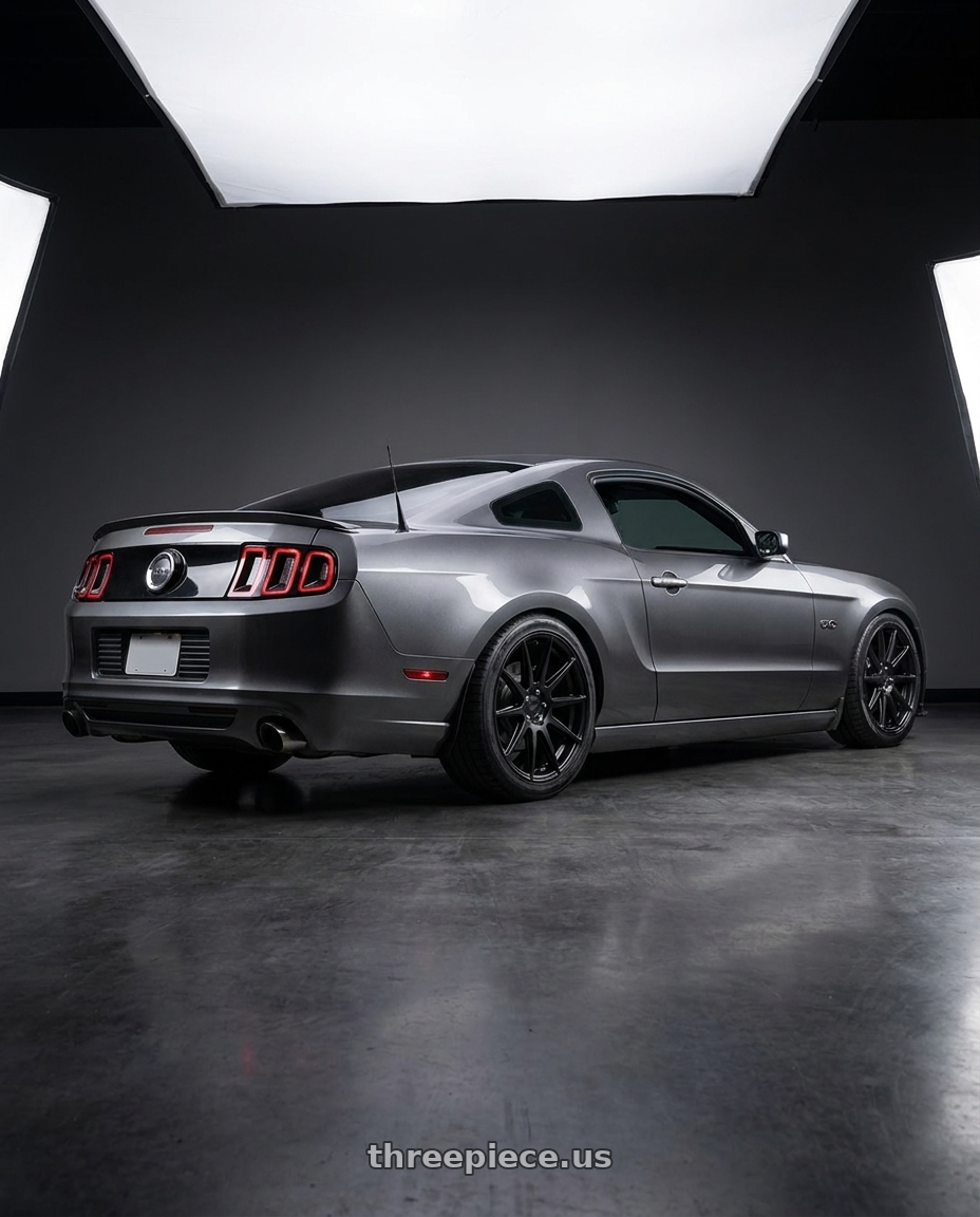 2014 Ford Mustang GT with Niche 1PC M147 ESSEN 5X114.3 20X9 +35 MATTE BLACK wheels rear three quarter view square tires