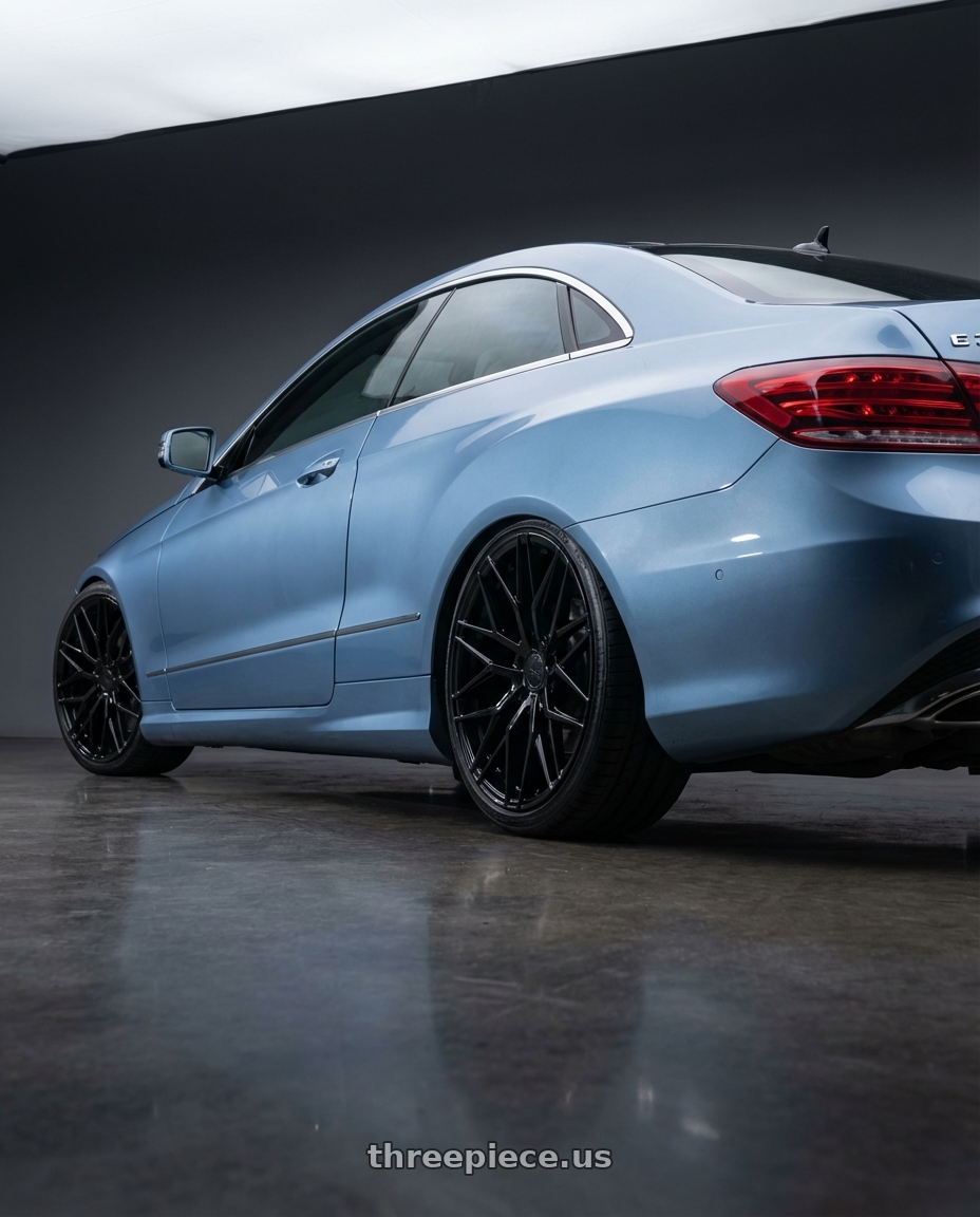 2014 Mercedes-Benz E-Class Coupe C207 with Avant Garde Wheels M520R 5X112 19x9.5 +40 Gloss Black wheels rear three quarter view square tires