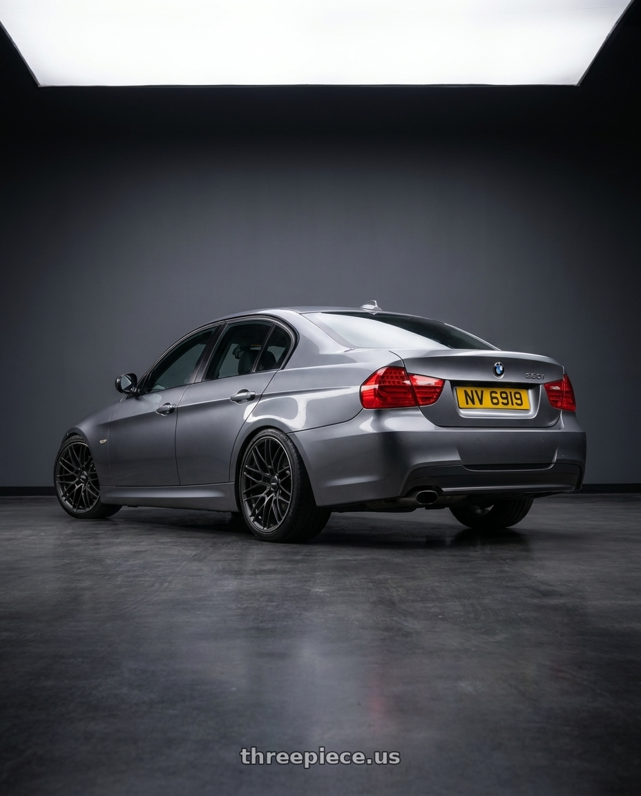 2009 e90 323i, space grey metallic with Volk Racing G025 5x120 19x9.5+25 Matte Gunblack / Rim Edge DC wheels rear three quarter view square tires