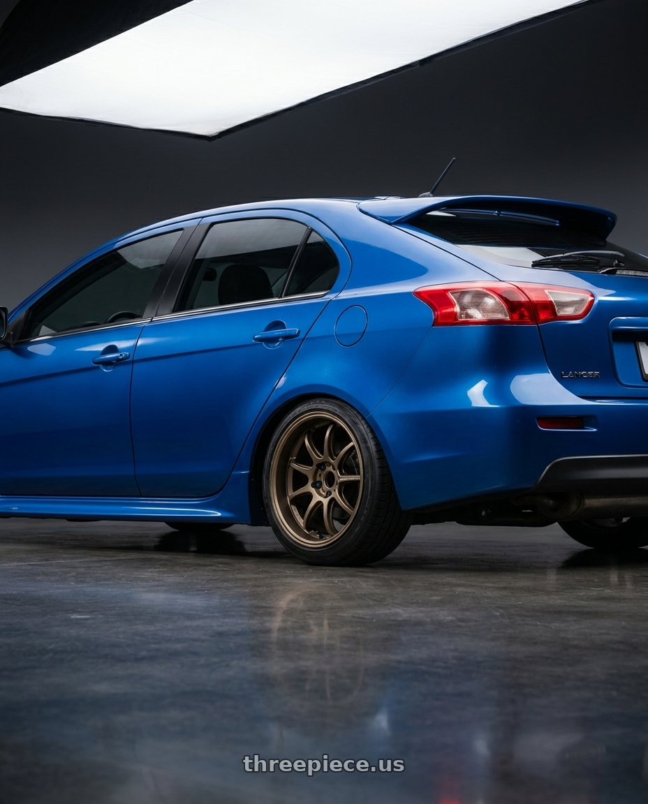 2014 lancer sportback  with Work Emotion D9r 5x114.3 18x8.5 +38 Matte Bronze wheels rear three quarter view slight stretch tires