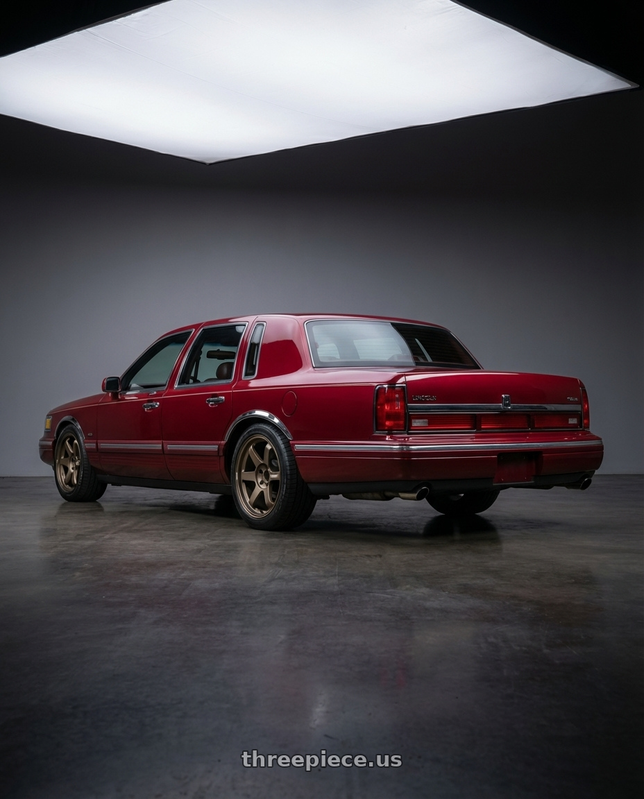 1991 Lincoln TownCar with Volk Racing TE37 Ultra M Spec 5x112 19x9.5+23 19x10.5+35 Bronze Almite Toyota Supra MK5 Spec wheels rear three quarter view square tires
