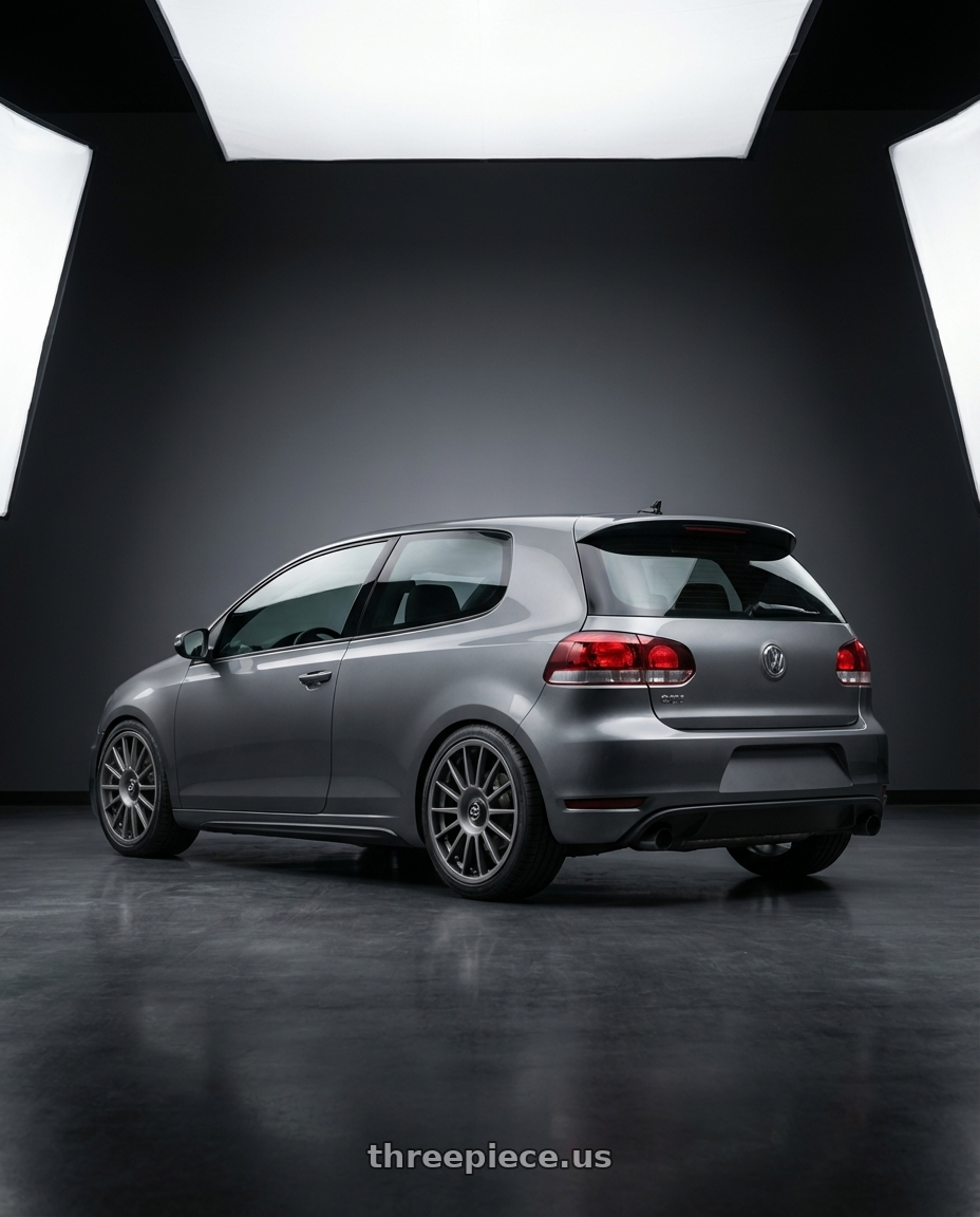 2013 Volkswagen GTI MK6 with fifteen52 PODIUM 5x112 / 5x120 18x8.5 +35 FROSTED GRAPHITE (SATIN GREY) wheels rear three quarter view square tires