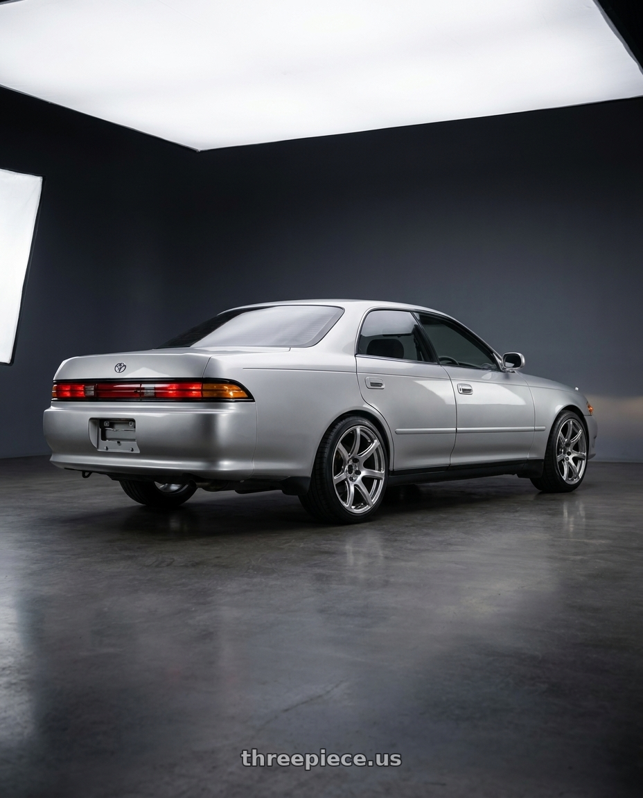 1995 Toyota Mark 2 with Work Emotion T7r 5x100 18x10.5 +12 Gt Silver wheels rear three quarter view square tires