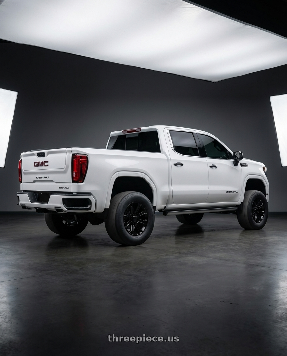 2023 gmc sierra 1500 denali with OEP 166B 6x139.7 22x9 +24 Gloss Black wheels rear three quarter view excessive tires