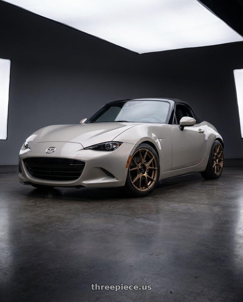 2021 Mazda MX-5 Miata ND with Konig Ampliform 5x114.3 17x9+40 Gloss Bronze wheels front three quarter view lowered stance