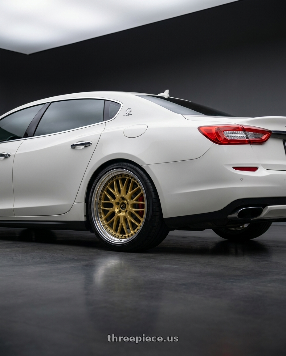 2014 maserati quattroporte gts  with Work Vs-Xx 5x114.3 20x11+43 T Disk Gold wheels rear three quarter view square tires