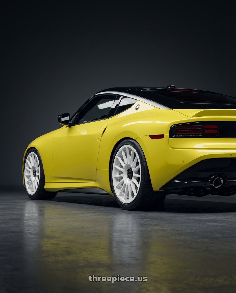 2024 Nissan Z with fifteen52 PODIUM 5x114.3 / 5x120 19x8.5 +35 RALLY WHITE (GLOSS WHITE) wheels rear three quarter view square tires