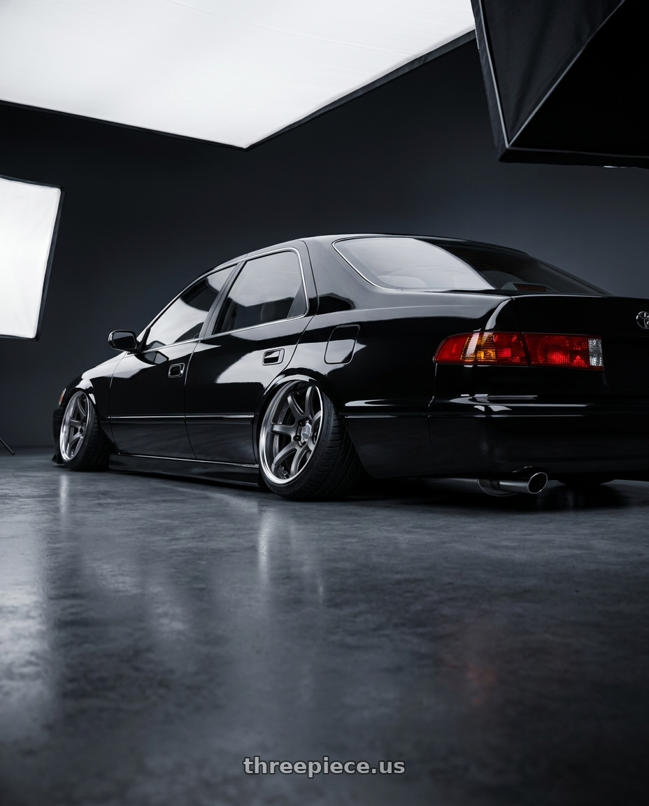 1998 Toyota Prius  with Work Emotion T7R 2P wheels rear three quarter view slight stretch tires
