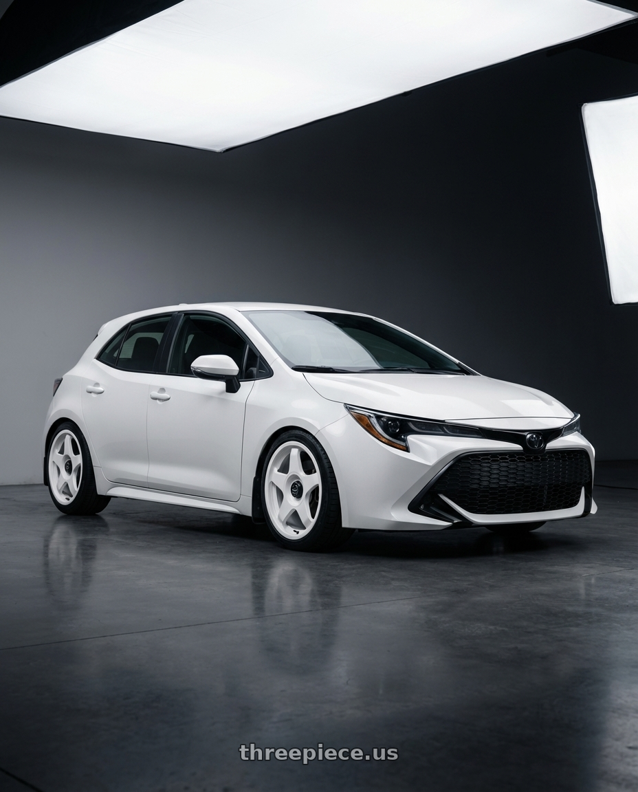 2023 Toyota Corolla Hatchback with fifteen52 CHICANE 5x114.3 / 5x100 18x8.5 +35 RALLY WHITE (GLOSS WHITE) wheels