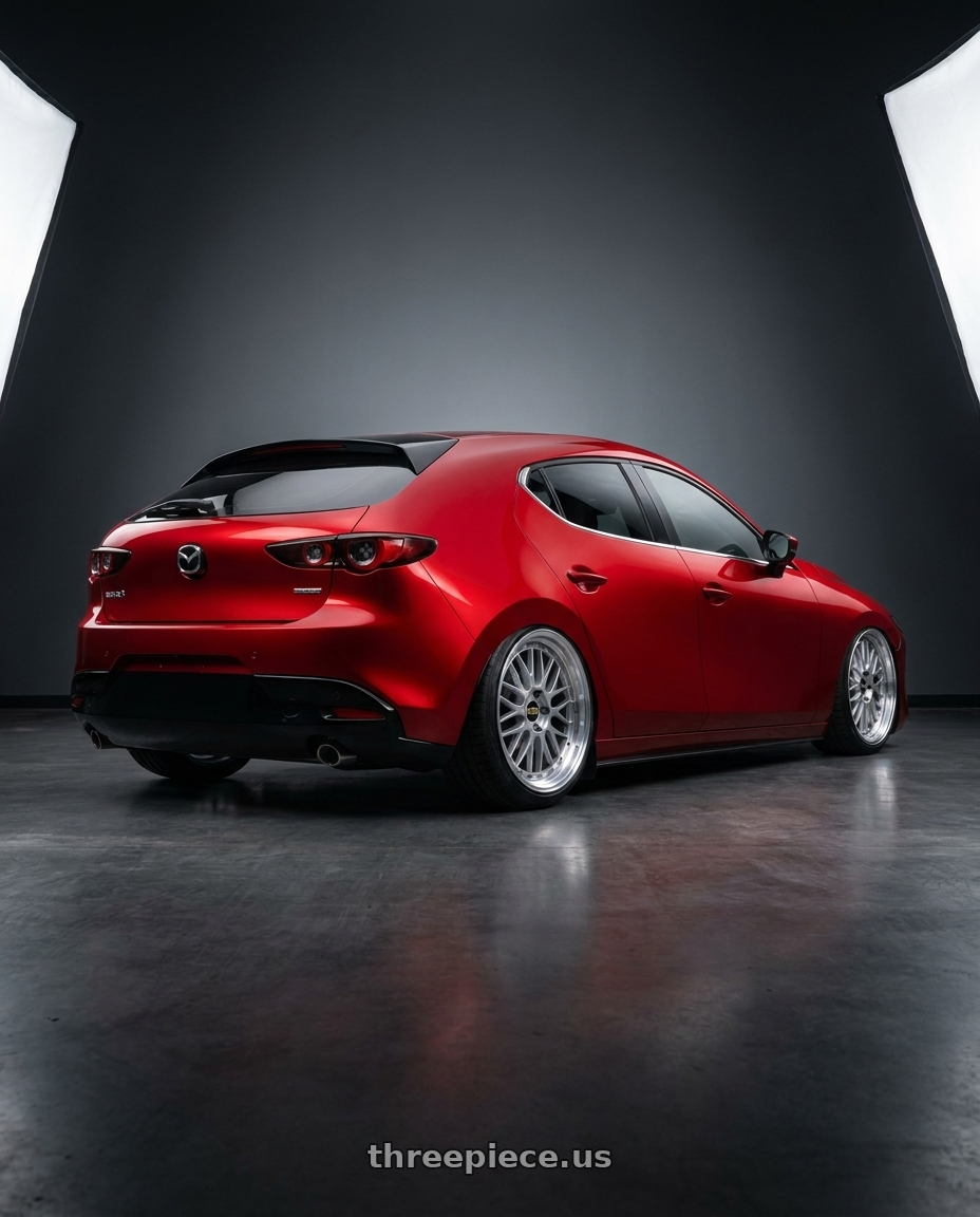 2024 Mazda 3 with BBS LM 5x114.3 19x9.0+38 Diamond Silver wheels rear three quarter view slight stretch tires