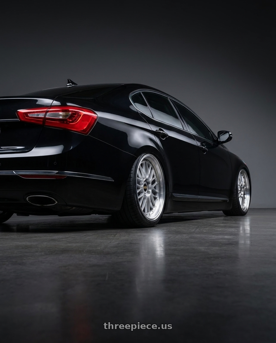 2014 Kia Cadenza Black with BBS LM 5x114.3 19x10.0+40 Diamond Silver wheels rear three quarter view square tires