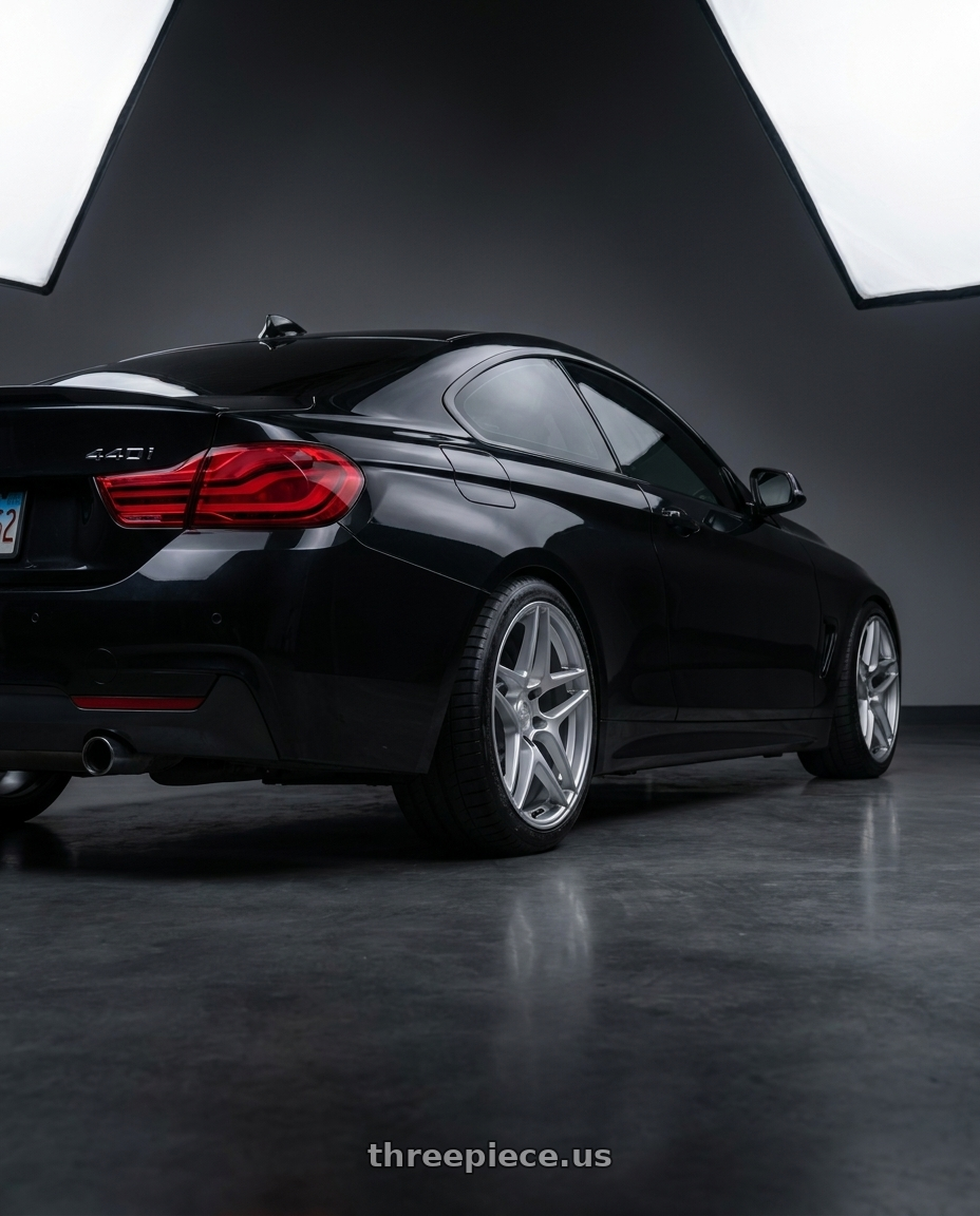 2020 BMW 440i xdrive with Kansei K15H Astro 5X120 19x10.5 35 Hyper Silver wheels rear three quarter view square tires