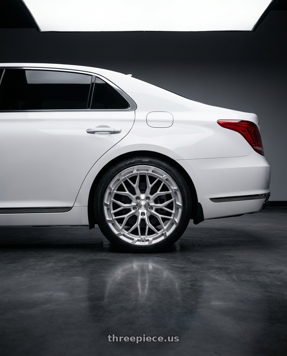 2018 genesis g90 ultimate with DOLCE PERFORMANCE MAGARI 5x114.3 20x10.5 +40 Gloss Silver wheels rear three quarter view square tires