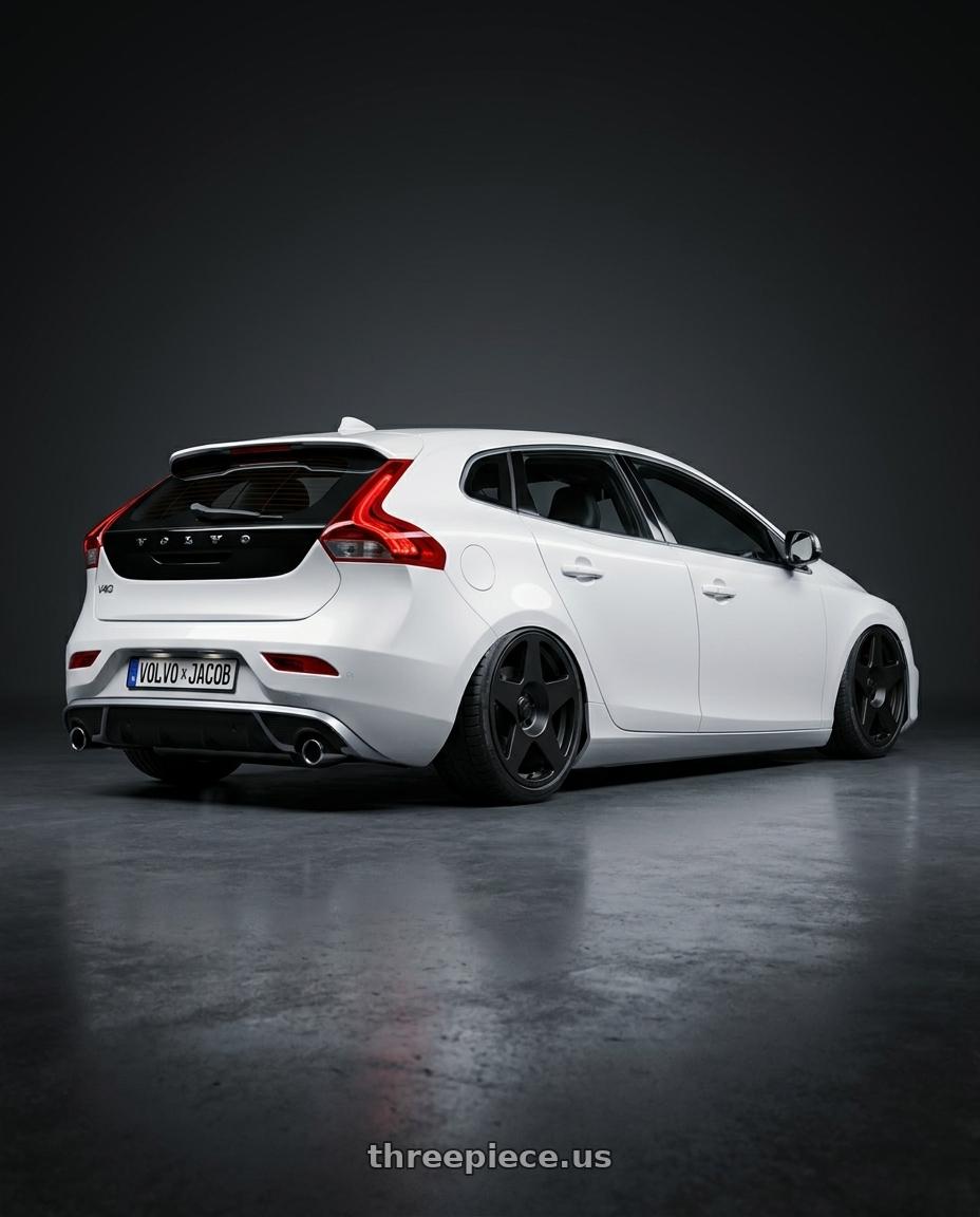 2015 Volvo V40 with fifteen52 TARMAC 5x108 18x8.5 +42 ASPHALT BLACK (SATIN BLACK) wheels rear three quarter view square tires
