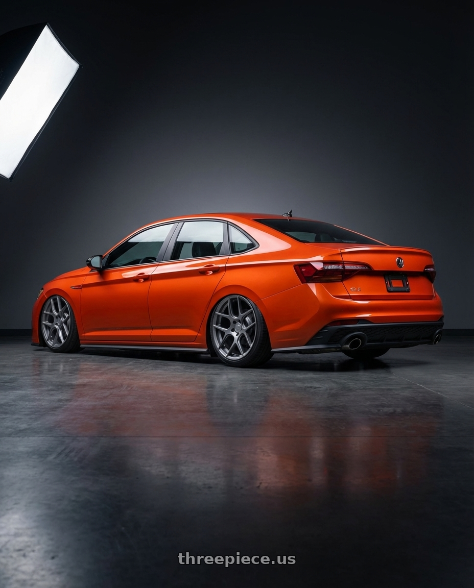 2023 Volkswagen Jetta GLI MK7 with Aodhan AFF2 5x112 19x9.5+35 Matte Gray wheels rear three quarter view slight stretch tires