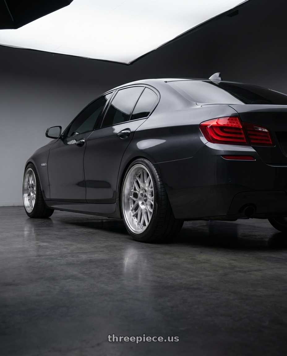 2011 BMW 535i with ESR Wheels CS18 5x120 18x9.5 +35 Hyper Silver wheels rear three quarter view meaty tires