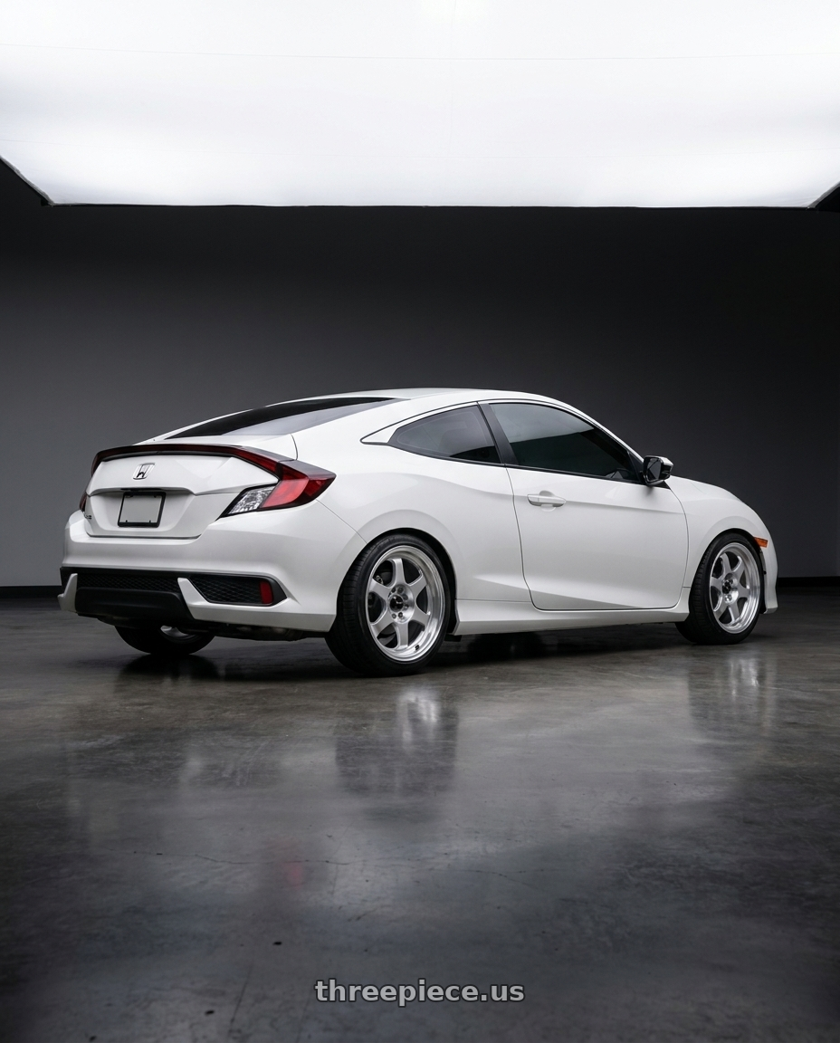 2017 Honda Civic with Vors SP1 4x100 15x7  +35 Silver Machine Face Lip wheels rear three quarter view square tires