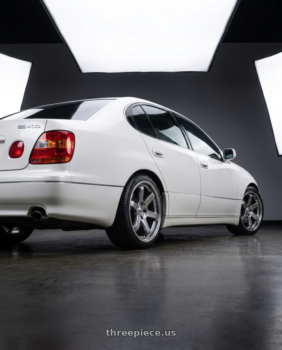 2000 Lexus gs400 with F1R F106 5x114.3 18x8.5 +35 Hyper Black wheels rear three quarter view square tires