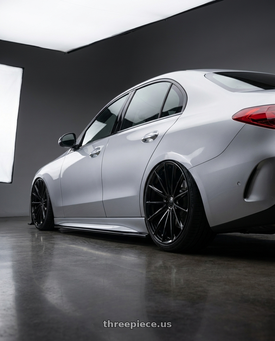 2024 Benz c300 with OHM PROTON 5X105 17X6.5 +45 GLOSS BLACK wheels rear three quarter view slight stretch tires