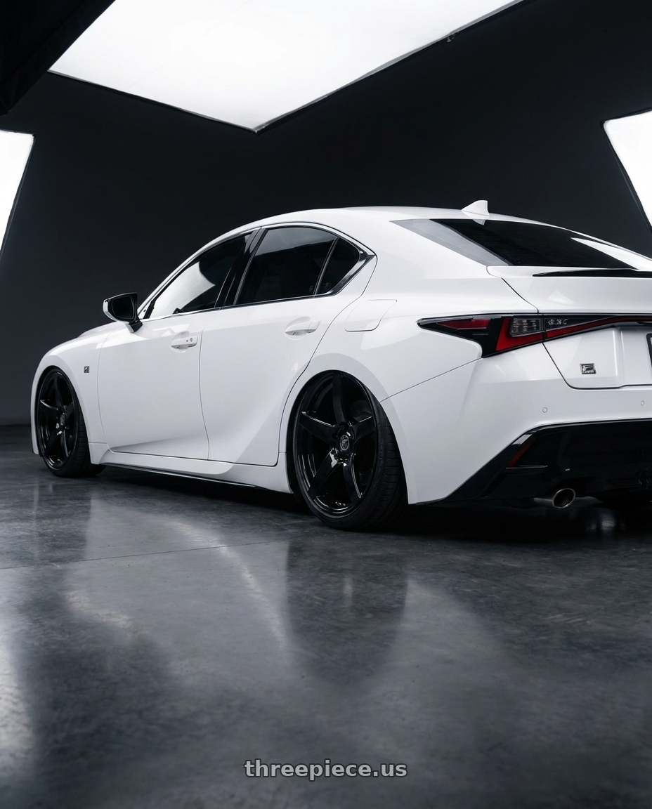 2024 Lexus IS 350 with Forgestar CF5 5x114.3 19x10 +42 Gloss Black wheels rear three quarter view slight stretch tires